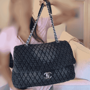Classic jumbo quilted flap bag with gold chain shoulder strap